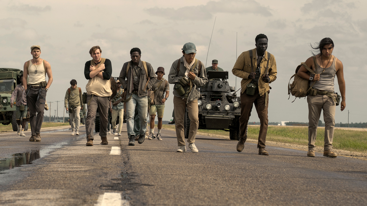 Charlie Plummer as Barkovitch, Garrett Wareing as Stebbins, Cooper Hoffman as Garraty, David Jonsson as McVries, Ben Wang as Olson, Tut Nyuot as Baker, and Joshua Odjick as Parker in The Long Walk