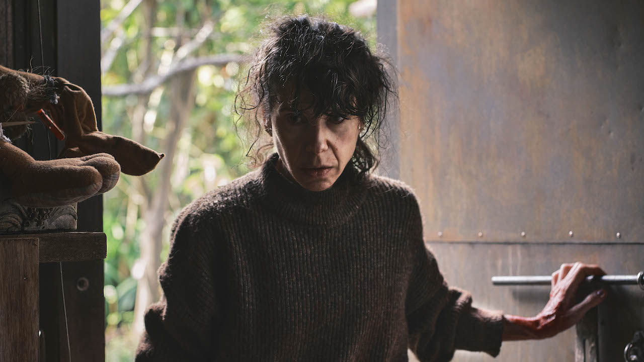 Sally Hawkins&#039; Laura walking into backyard shed in Bring Her Back